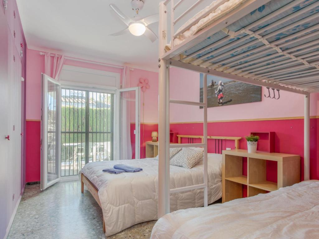 Postel nebo postele na pokoji v ubytování Holiday Home Erbanozi by Interhome