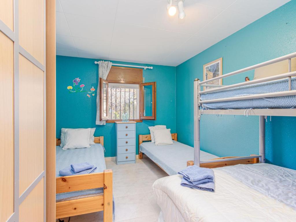 Postel nebo postele na pokoji v ubytování Holiday Home Erbanozi by Interhome