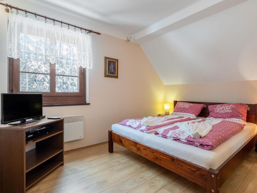 Postel nebo postele na pokoji v ubytování Holiday Home Jelení kout by Interhome