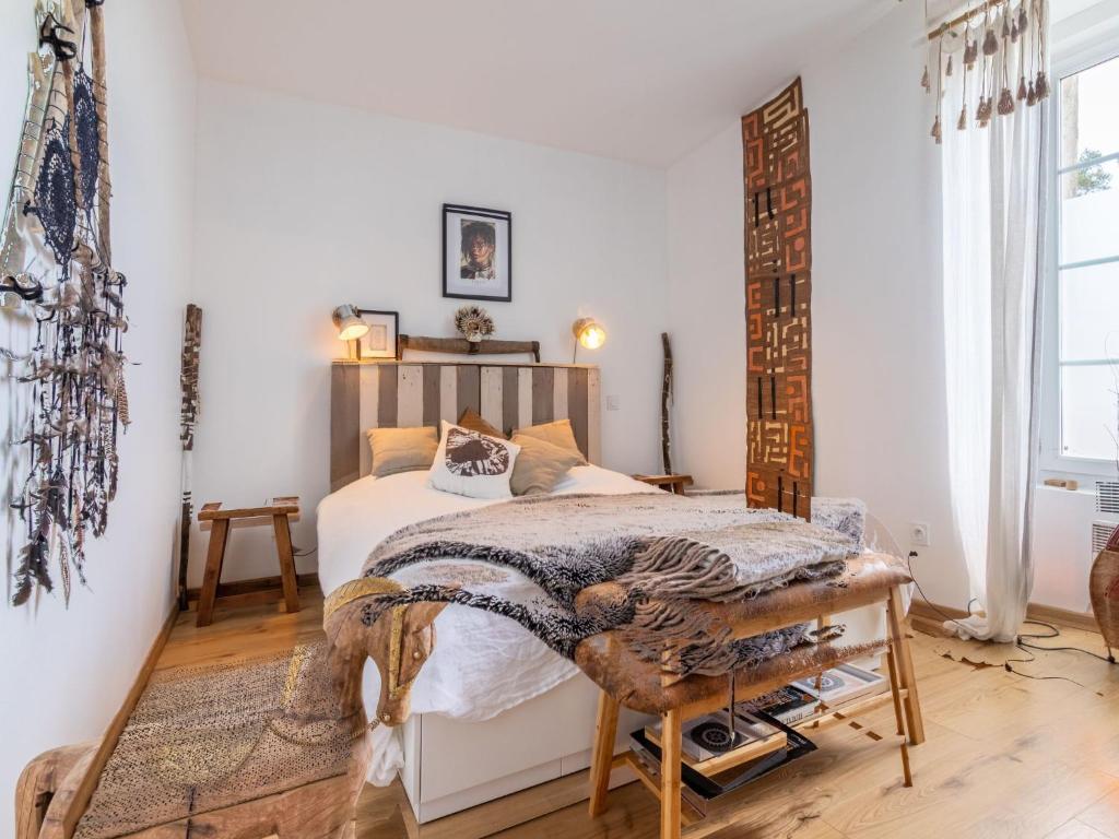 Una cama o camas en una habitaci&oacute;n de Holiday Home La Maison des Fr&egrave;res-1 by Interhome