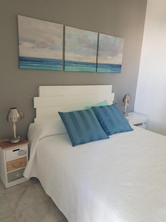 Postel nebo postele na pokoji v ubytování Casa el Jardin de Indalo - Mojacar Playa