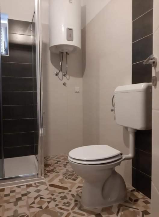 Koupelna v ubytování Apartments Adria