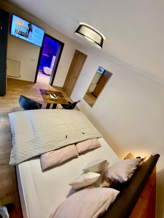 Katil atau katil-katil dalam bilik di Gasthof Rieder Stubn Hotel#Restaurant#Pinseria
