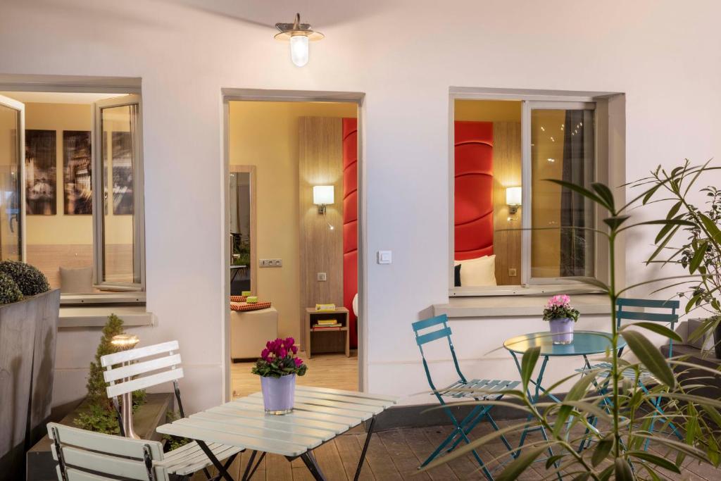 Coin salon dans l'établissement Hôtel L'Interlude