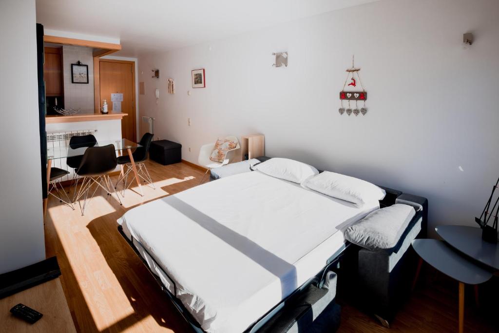 Postel nebo postele na pokoji v ubytování Apartaments Ashome