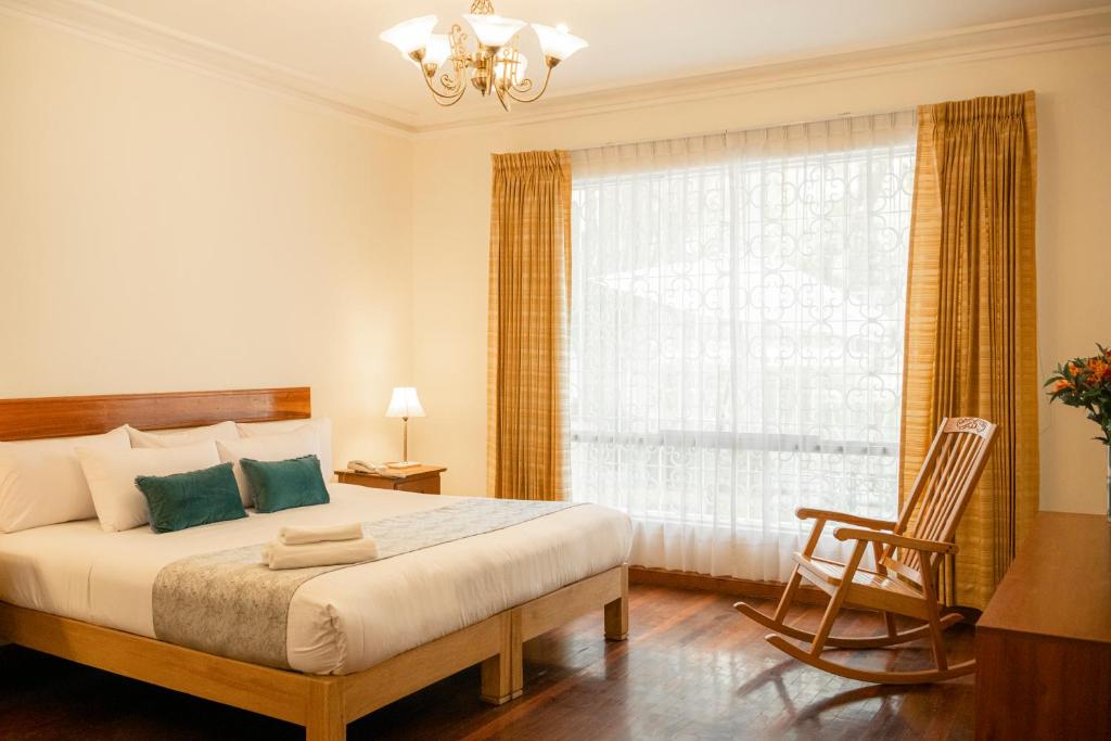 Un pat sau paturi într-o cameră la Hotel Casa Campo by Cassana