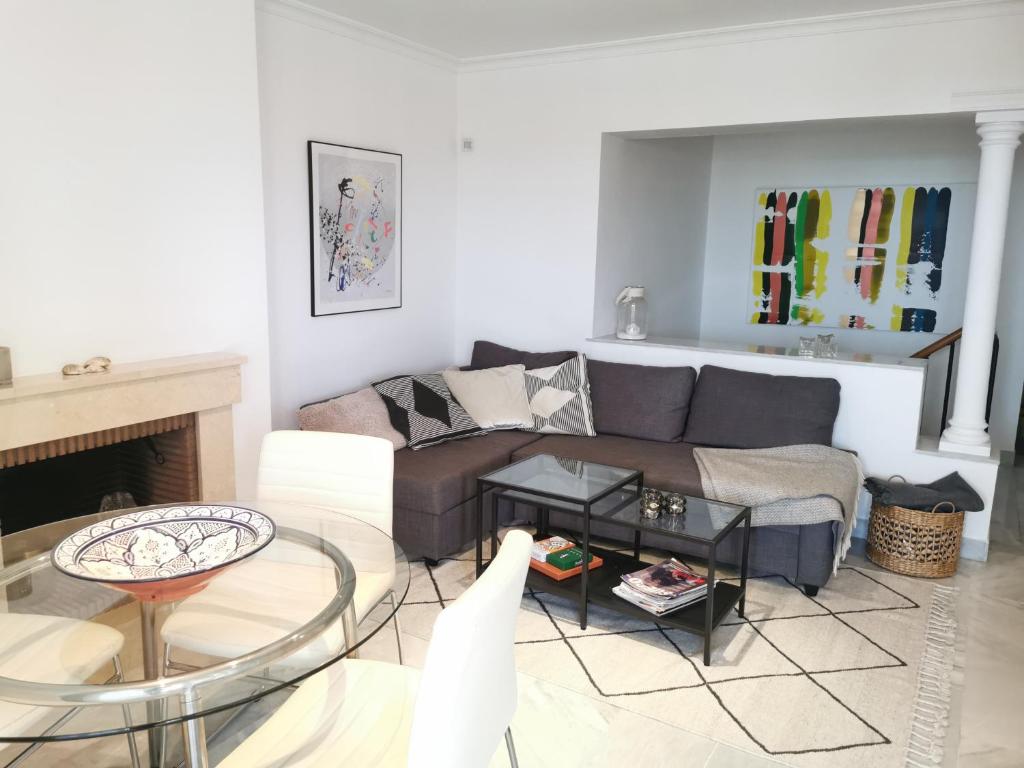 A seating area at Walking distance to Puerto Banus sea view Apartment