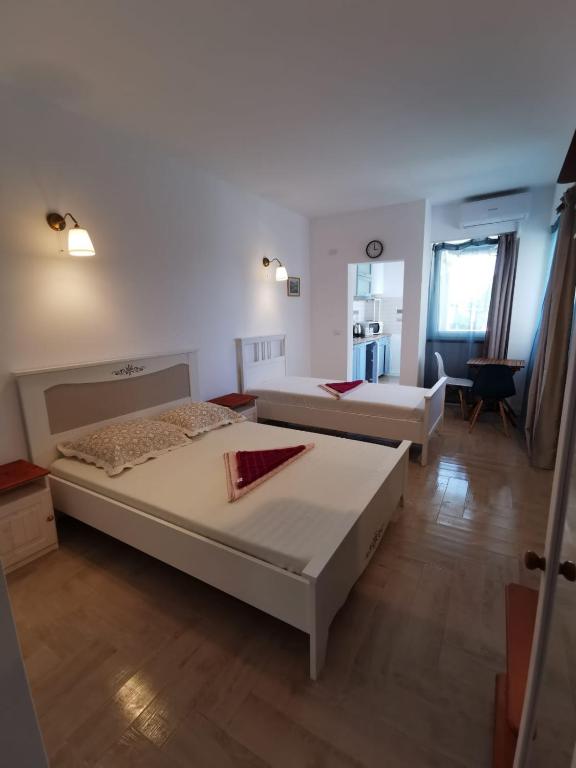 Llit o llits en una habitació de EFORIE STUDIOS