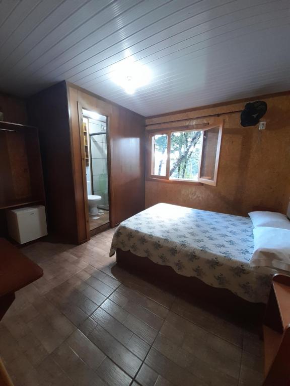 Quartos Recanto da Natureza interior Canela - Suite Di Famiglia