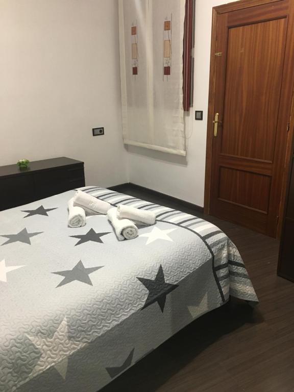Postel nebo postele na pokoji v ubytování Vivienda con Fines Turísticos Salvador
