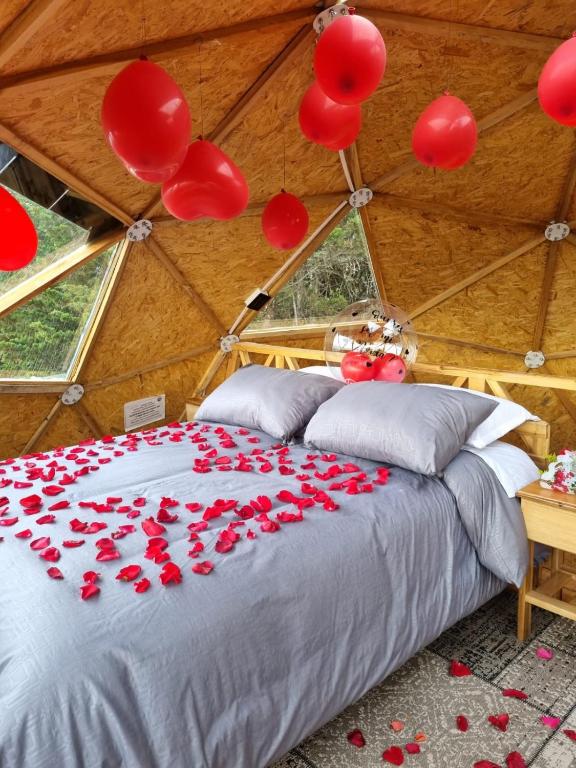 Postel nebo postele na pokoji v ubytování Glamping El Edén Guasca Cundinamarca
