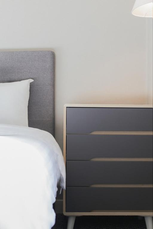 Postel nebo postele na pokoji v ubytování Kensington Hotel Yeouido