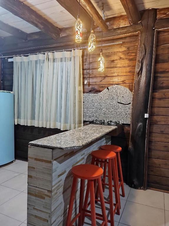 Foto da galeria de Cabana rústica a 900m da Praia da Ribanceira em Imbituba