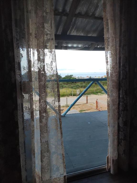 Foto da galeria de Cabana rústica a 900m da Praia da Ribanceira em Imbituba