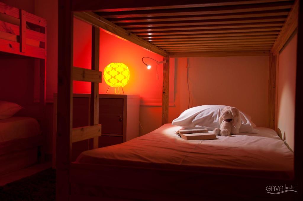 Postel nebo postele na pokoji v ubytování GAVA hostel