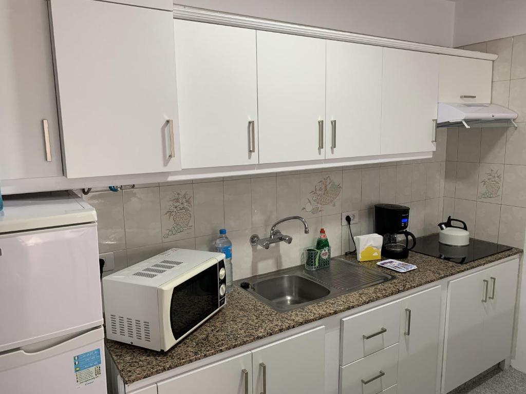 Kuchyň nebo kuchyňský kout v ubytování Vivienda Vacacional a 50 Metros de la Playa