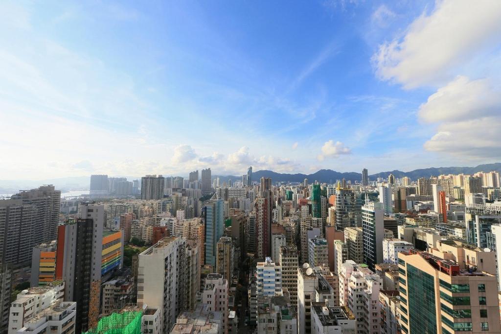 Nespecifikovaný výhled na destinaci Hongkong nebo výhled na město při pohledu z hotelu