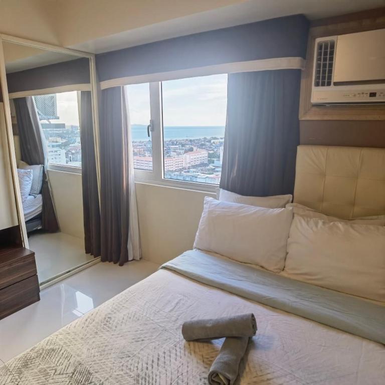 Avida Davao by davaobnb & Lemonique Homes - Triple Chambre De Luxe Avec Vue Sur La Mer