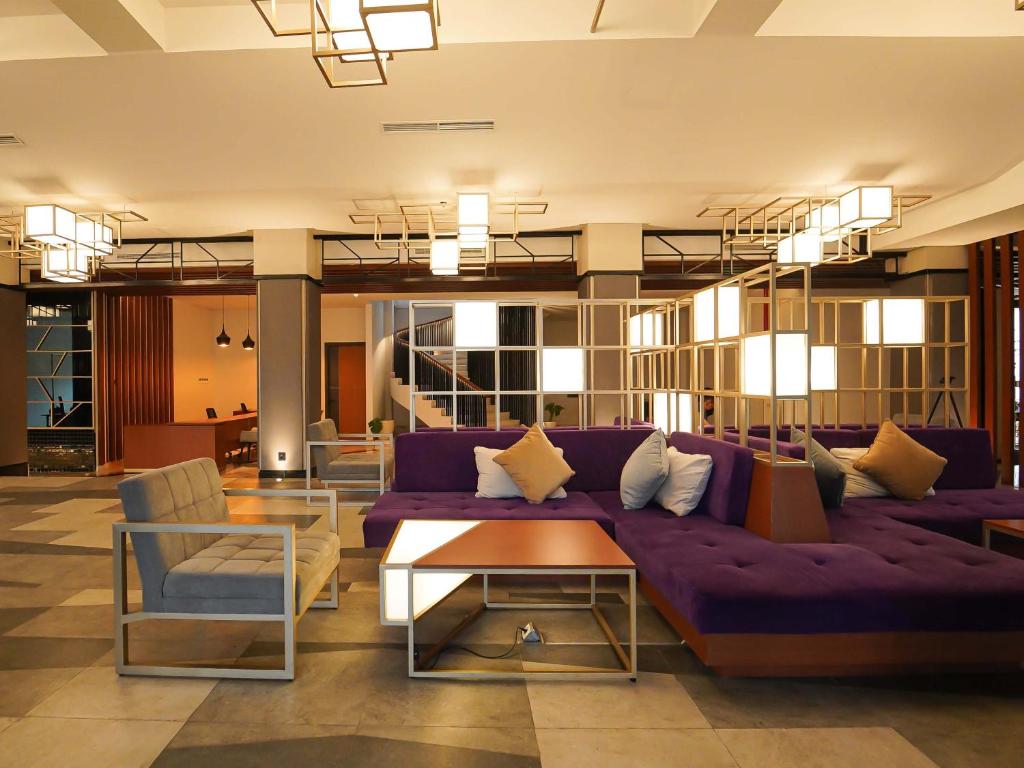 Χώρος καθιστικού στο Rayz UMM Hotel Malang