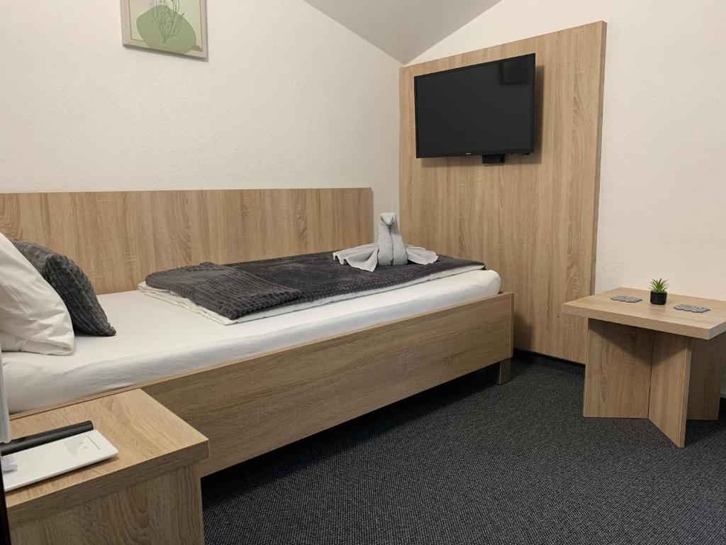 Postel nebo postele na pokoji v ubytování Pension 1310