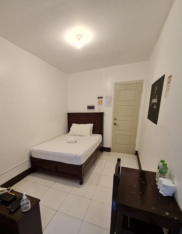 Postel nebo postele na pokoji v ubytování AMARANTA SUITES