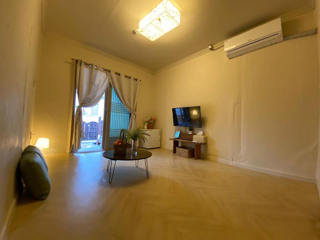 TV a/nebo společenská místnost v ubytování Pungnam House
