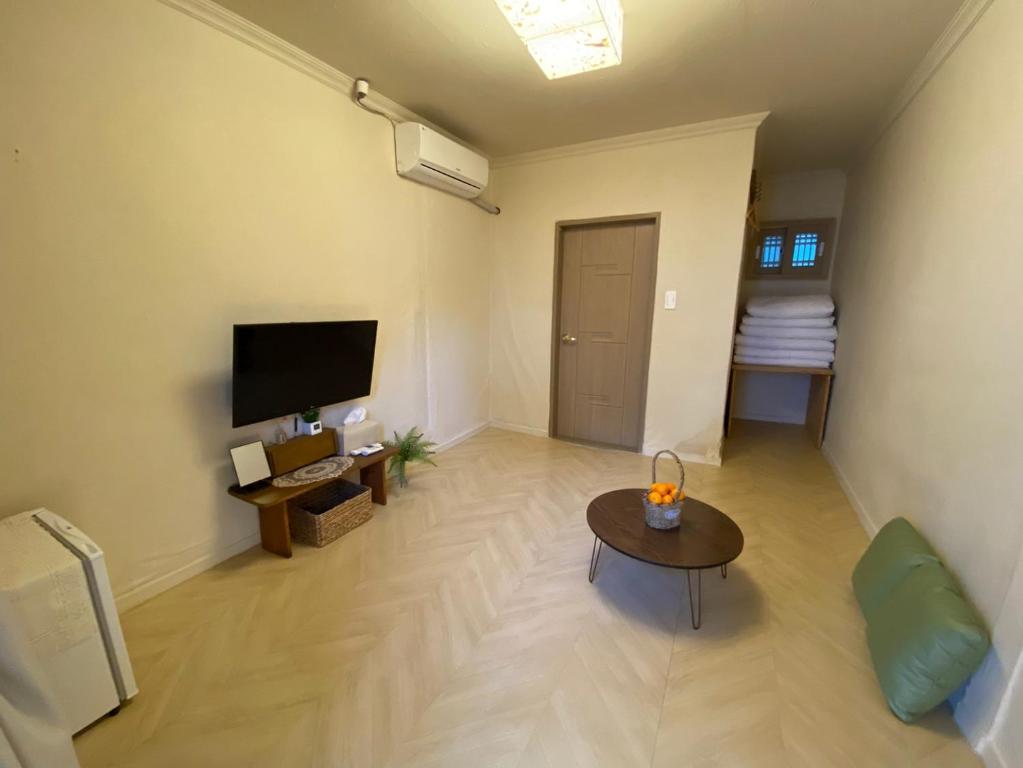 TV a/nebo společenská místnost v ubytování Pungnam House