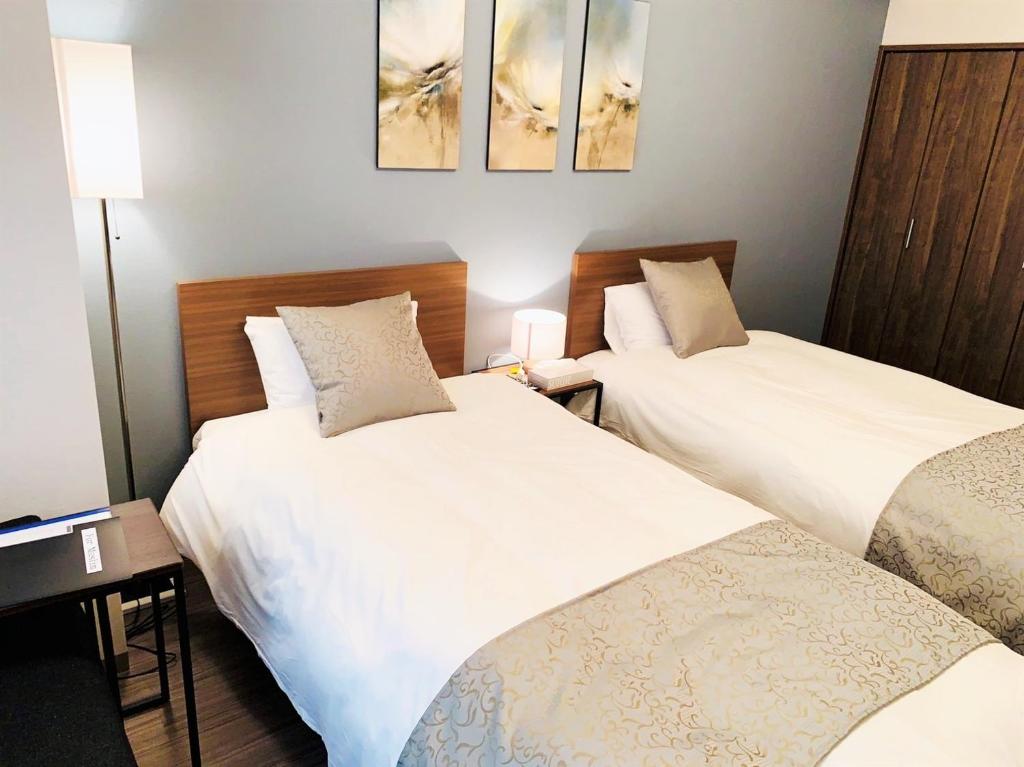 Кровать или кровати в номере @RLiS_house Tsutenkaku - Vacation STAY 7971
