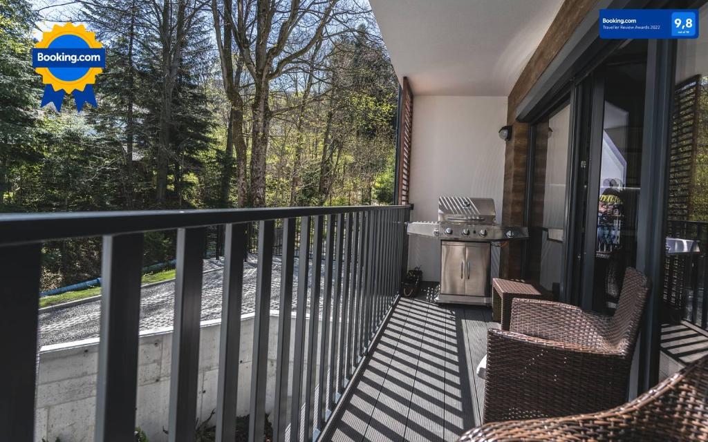 Balkón alebo terasa v ubytovaní Apartamenty SPOKOLOKO Skrzyczne Residence Korzenny i Kamienny