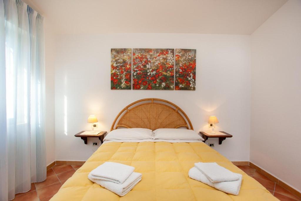 A bed or beds in a room at Casa Barvis