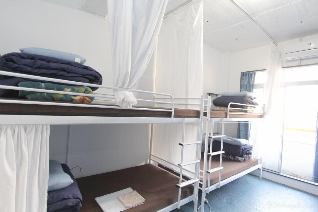 Palanda nebo palandy na pokoji v ubytování Otohaya Guesthouse
