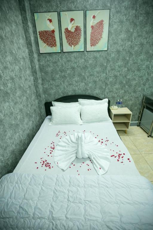 Postel nebo postele na pokoji v ubytování Nhà Nghỉ Kim Lài - Đối diện bệnh viện tỉnh Gia Lai -132 Tôn Thất Tùng