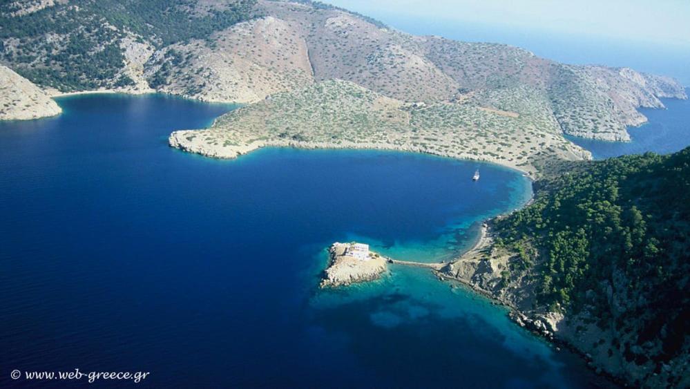 an aerial view of a large body of water at Symi . VILLA CALME (Sur la Mer). in Symi
