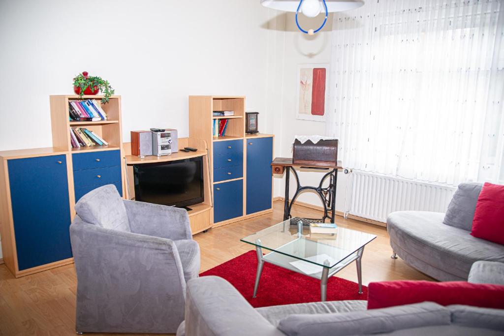 TV a/nebo společenská místnost v ubytování Ferienhaus Rike