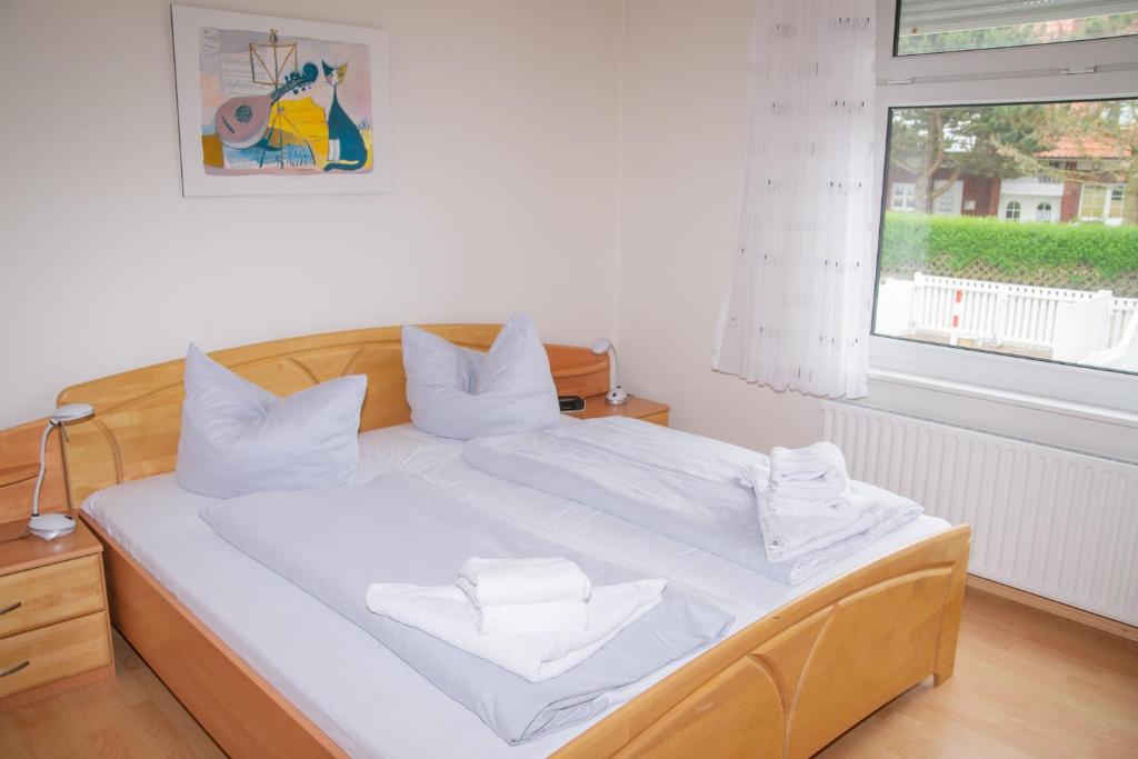 Postel nebo postele na pokoji v ubytování Ferienhaus Rike