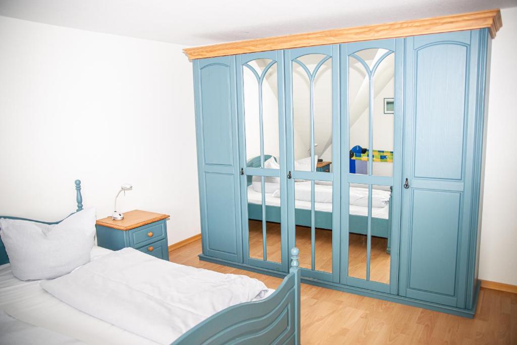 Postel nebo postele na pokoji v ubytování Ferienhaus Rike