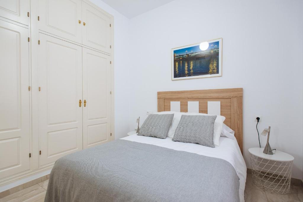 Postel nebo postele na pokoji v ubytování Siete Revueltas Suite Apartment