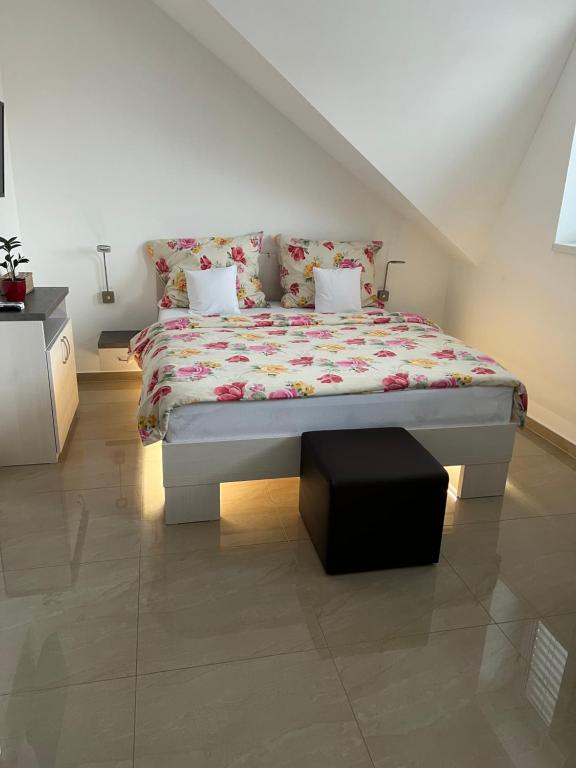 Postel nebo postele na pokoji v ubytování Penzion vinařství Mikulica