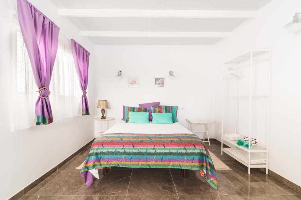 Postel nebo postele na pokoji v ubytování Home2Book Comfy Duplex La Isleta, BBQ & Wifi