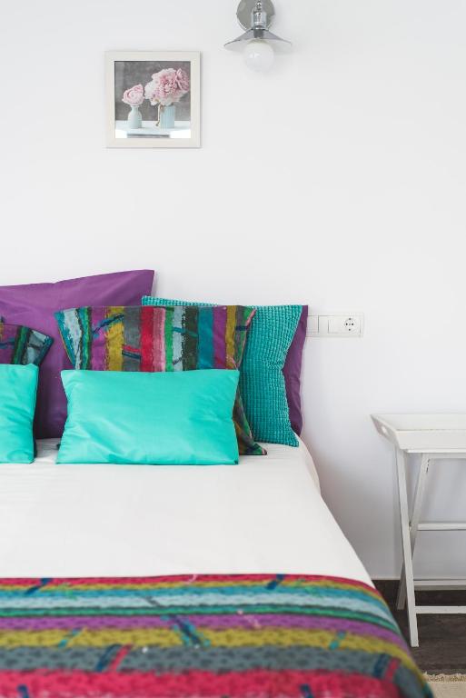 Postel nebo postele na pokoji v ubytování Home2Book Comfy Duplex La Isleta, BBQ & Wifi