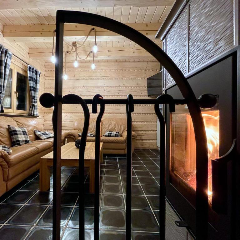 Postel nebo postele na pokoji v ubytování Roubenka pod Lysou - Malenovice