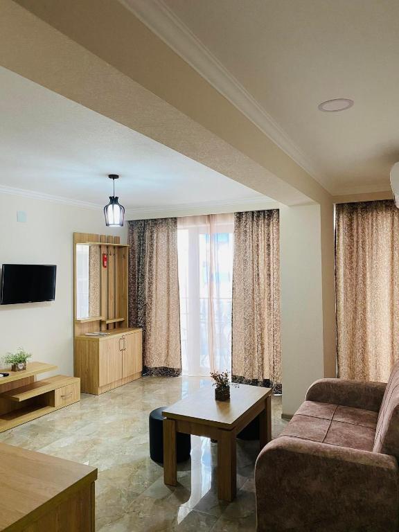 TV a/nebo společenská místnost v ubytování sea view rooms in Batumi