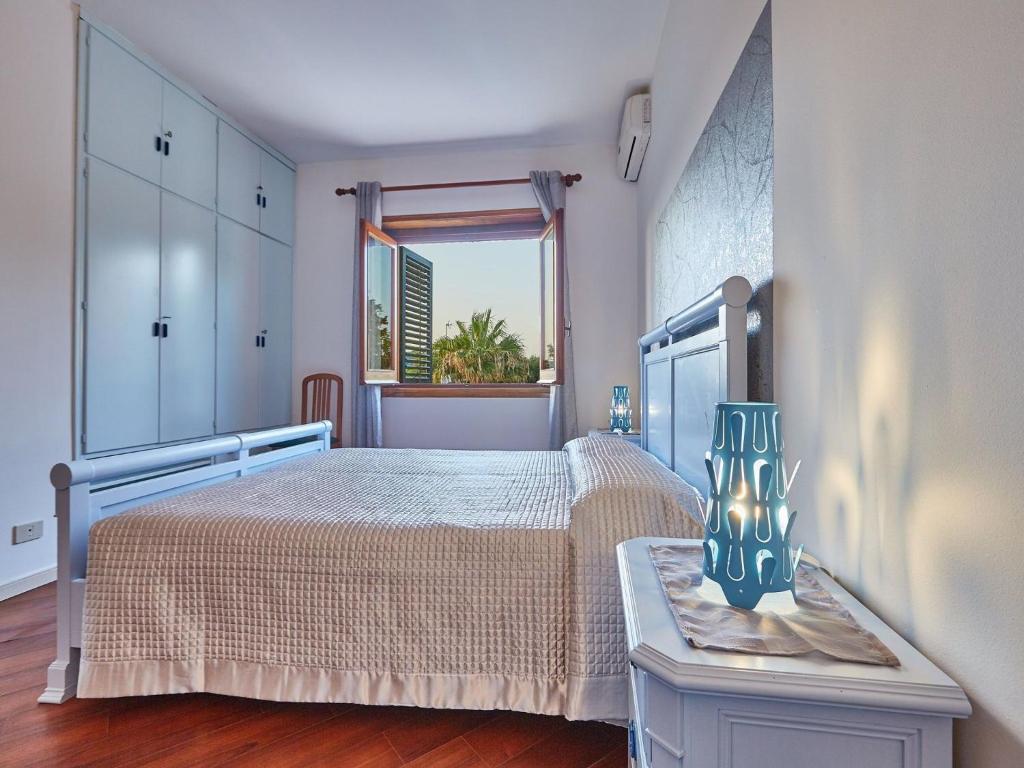 A bed or beds in a room at Baroque Bliss Luxurious Villa
