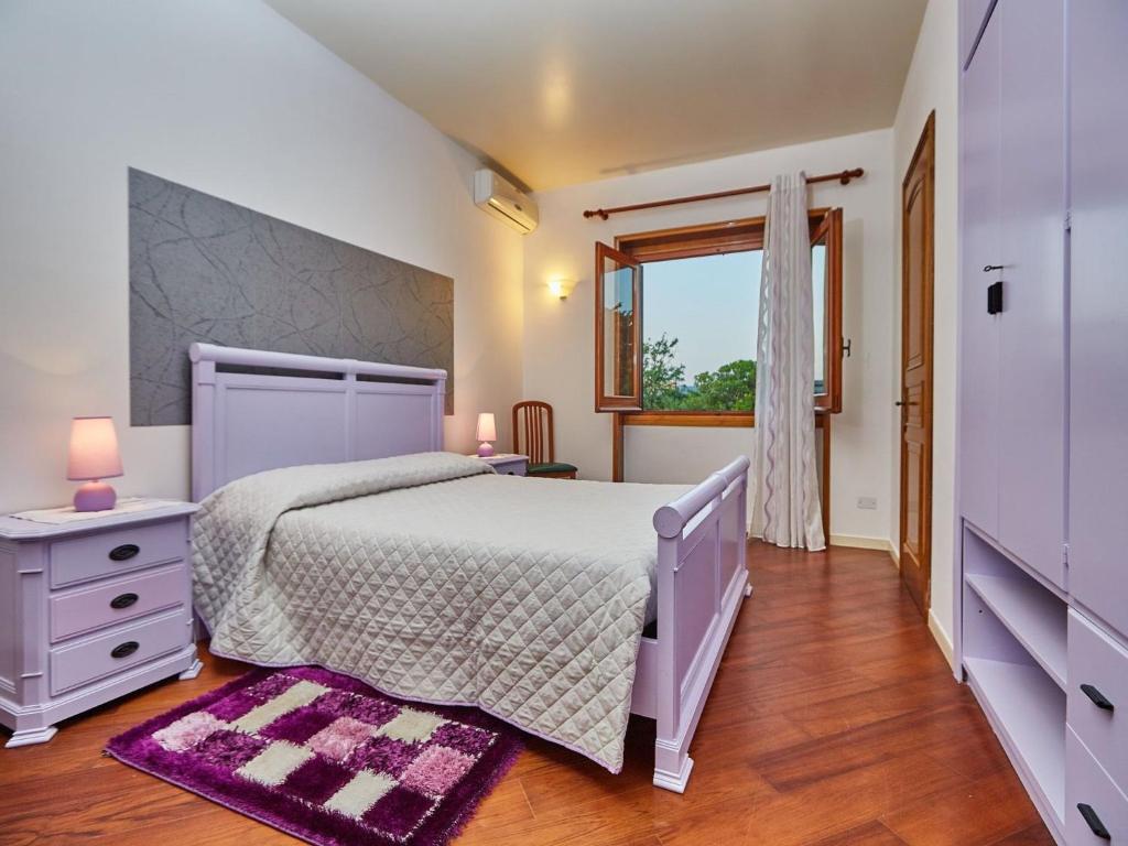 A bed or beds in a room at Baroque Bliss Luxurious Villa