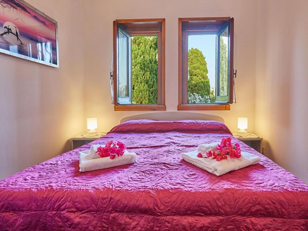 A bed or beds in a room at Baroque Bliss Luxurious Villa