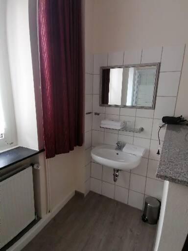 Koupelna v ubytování Hotel Schillerquartier