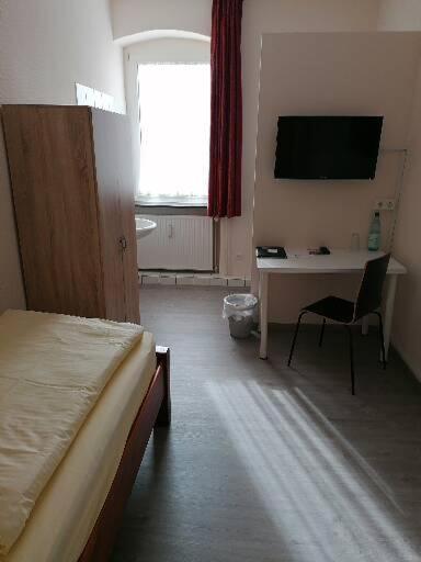 TV a/nebo společenská místnost v ubytování Hotel Schillerquartier