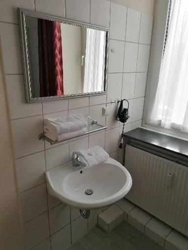 Koupelna v ubytování Hotel Schillerquartier