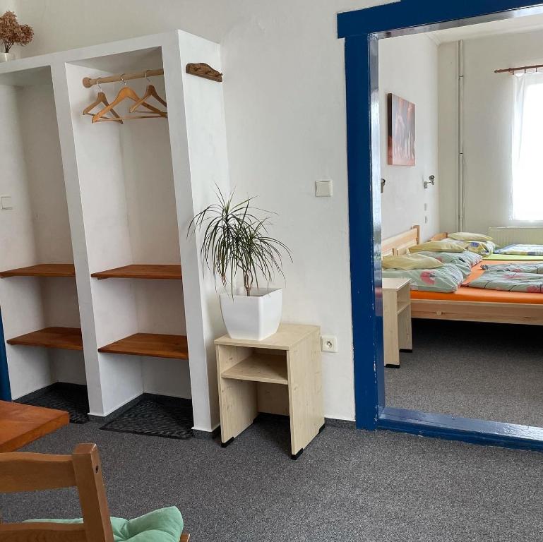 Postel nebo postele na pokoji v ubytování Penzion Slunečnice