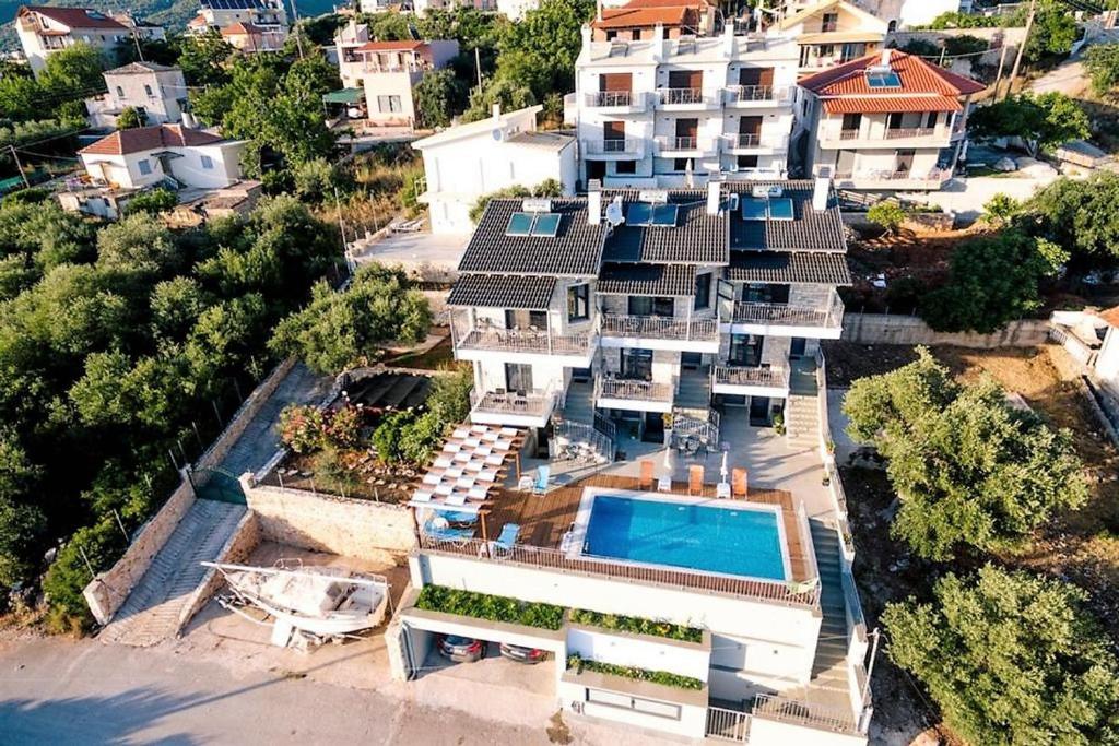 an aerial view of a house with a swimming pool at Villa "Mons & Mare" in Perdika